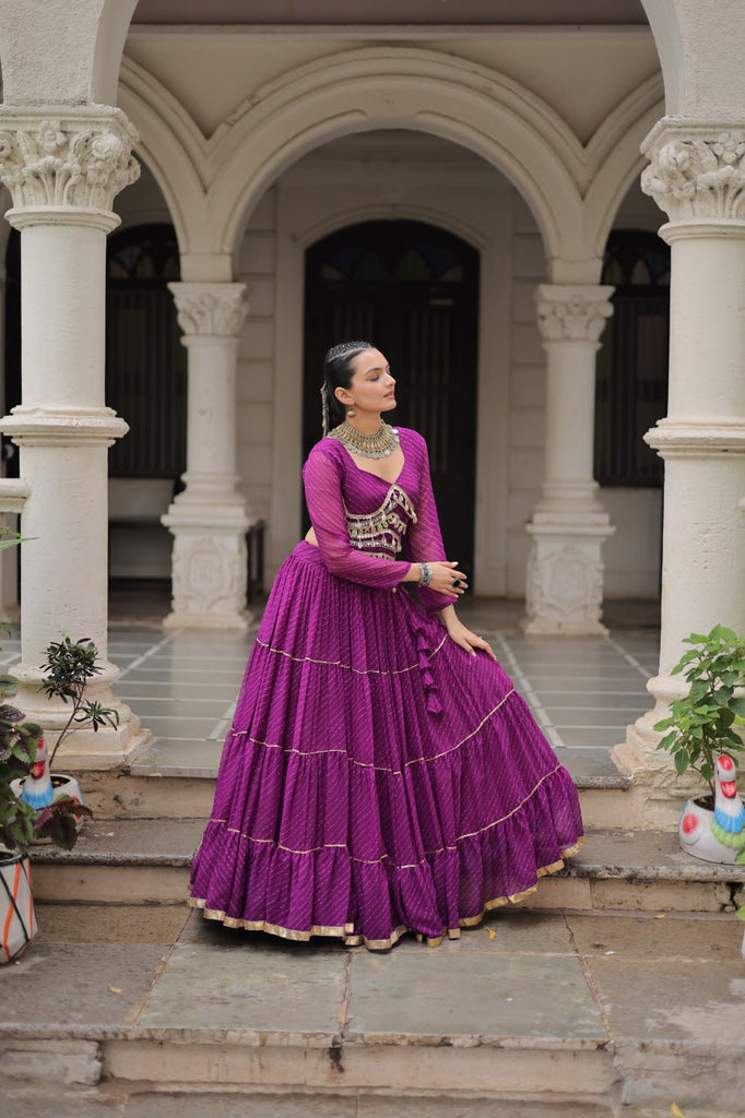 Purple Navratri Special Leheriya Print Lehenga Choli with 12 Mtr Flair & Mirror Lace Work ClothsVilla