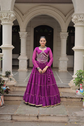 Purple Navratri Special Leheriya Print Lehenga Choli with 12 Mtr Flair & Mirror Lace Work ClothsVilla