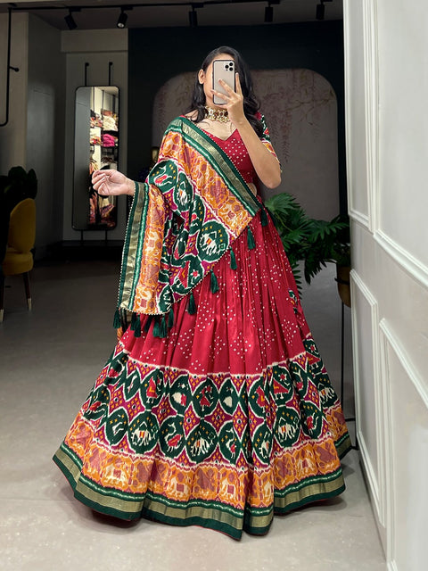 Radiant Red Tussar Silk Lehenga Choli with Enchanting Patola Print & Foil Work ClothsVilla Main image