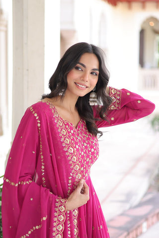 Rani Pink Rich Sequins & Zari Embroidered Faux Georgette Gown with Cut-Work Dupatta – Full Sleeves, Fancy V-Neck, Fully Stitched ClothsVilla