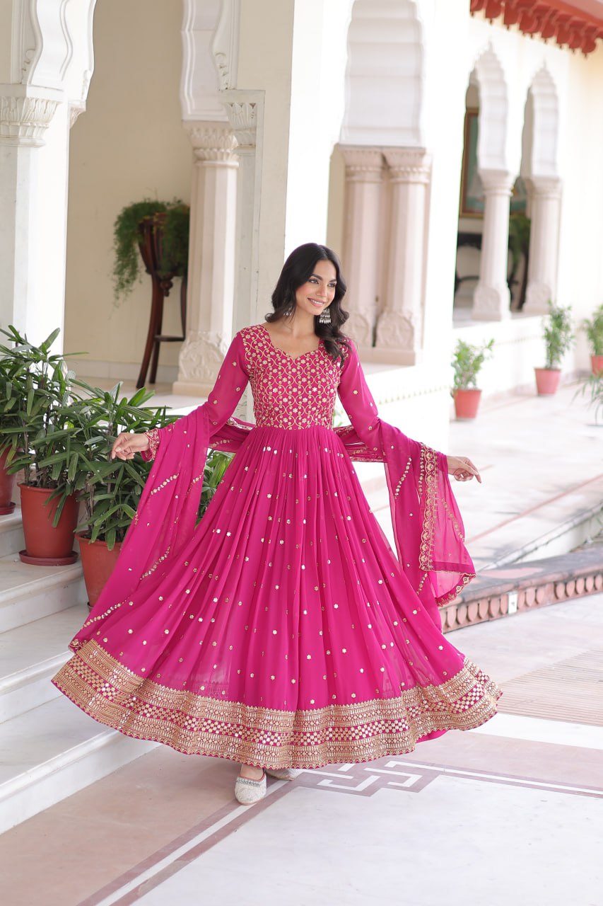 Rani Pink Rich Sequins & Zari Embroidered Faux Georgette Gown with Cut-Work Dupatta – Full Sleeves, Fancy V-Neck, Fully Stitched ClothsVilla