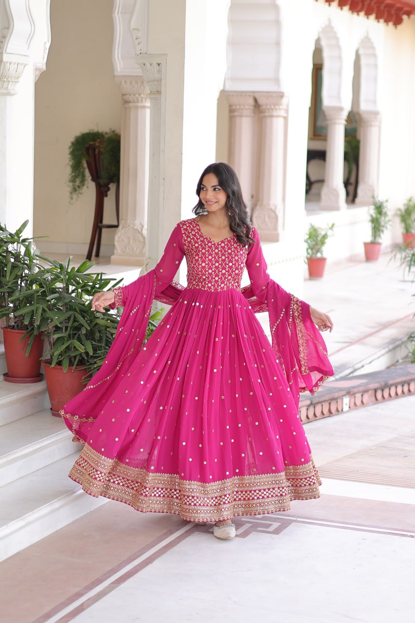 Rani Pink Rich Sequins & Zari Embroidered Faux Georgette Gown with Cut-Work Dupatta – Full Sleeves, Fancy V-Neck, Fully Stitched ClothsVilla