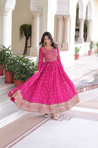 Rani Pink Rich Sequins & Zari Embroidered Faux Georgette Gown with Cut-Work Dupatta – Full Sleeves, Fancy V-Neck, Fully Stitched ClothsVilla