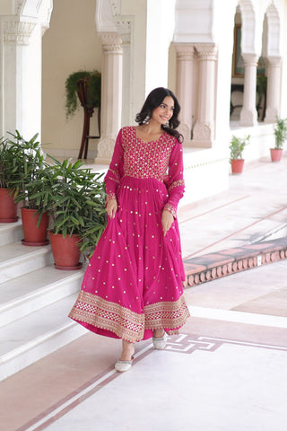Rani Pink Rich Sequins & Zari Embroidered Faux Georgette Gown with Cut-Work Dupatta – Full Sleeves, Fancy V-Neck, Fully Stitched ClothsVilla