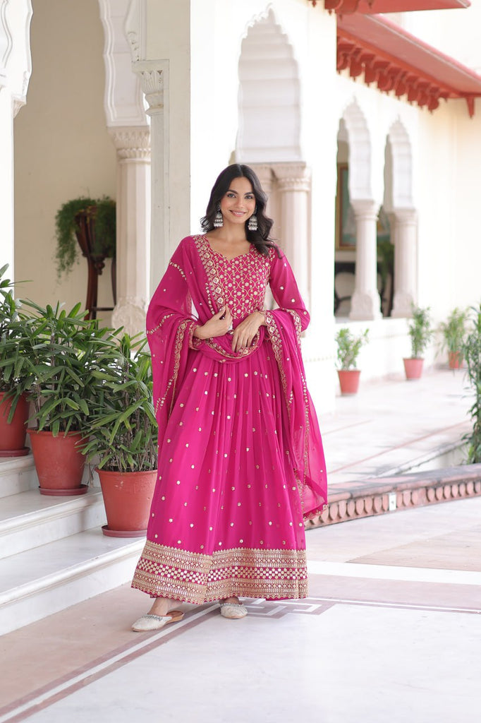 Rani Pink Rich Sequins & Zari Embroidered Faux Georgette Gown with Cut-Work Dupatta – Full Sleeves, Fancy V-Neck, Fully Stitched ClothsVilla