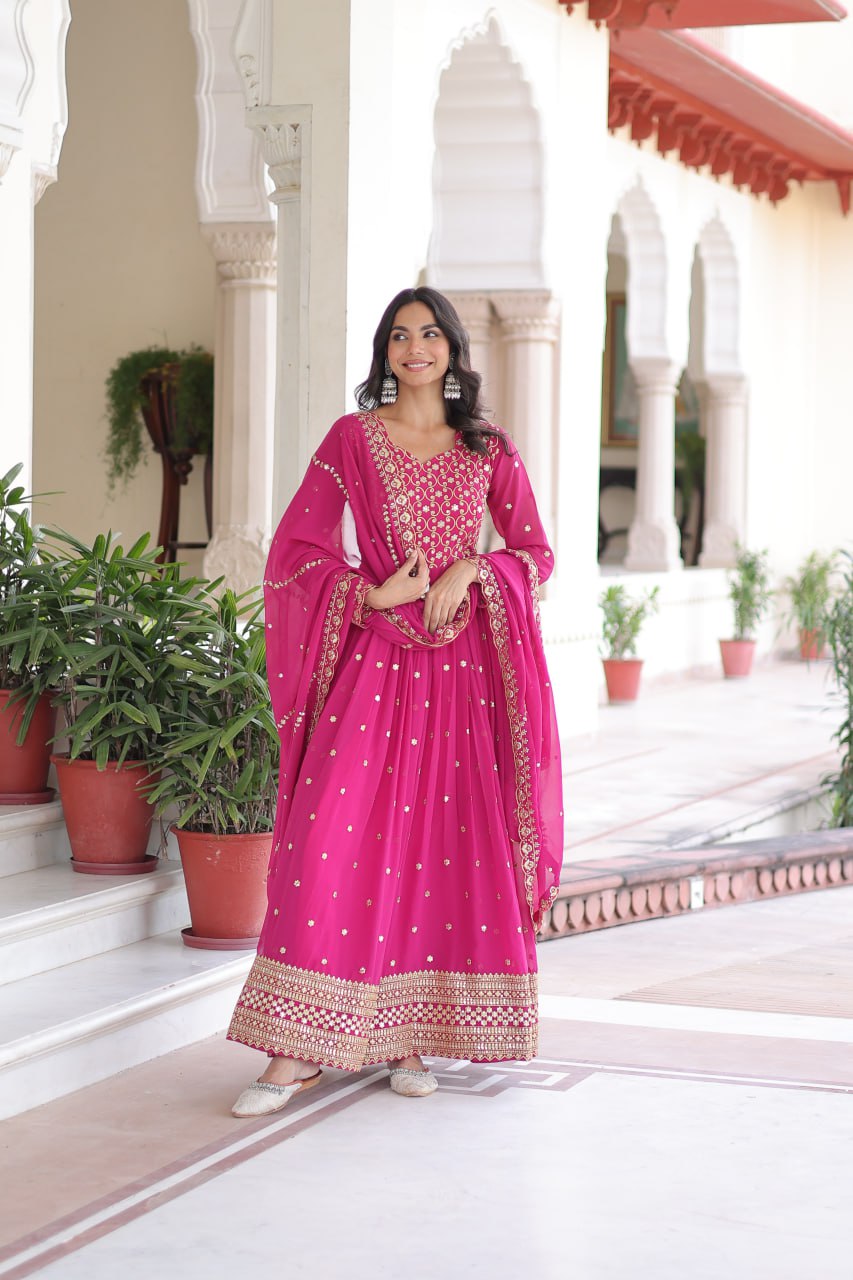 Rani Pink Rich Sequins & Zari Embroidered Faux Georgette Gown with Cut-Work Dupatta – Full Sleeves, Fancy V-Neck, Fully Stitched ClothsVilla
