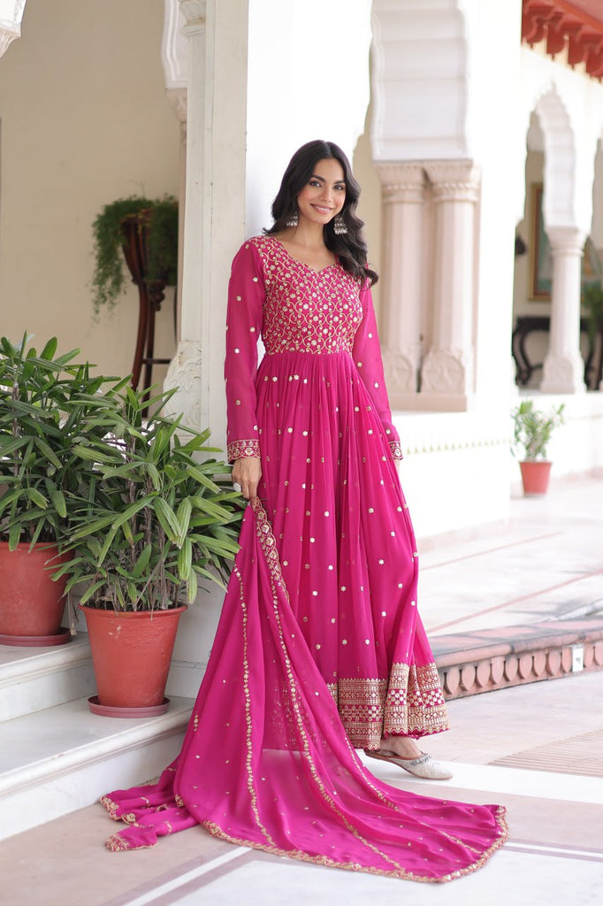 Rani Pink Rich Sequins & Zari Embroidered Faux Georgette Gown with Cut-Work Dupatta – Full Sleeves, Fancy V-Neck, Fully Stitched ClothsVilla