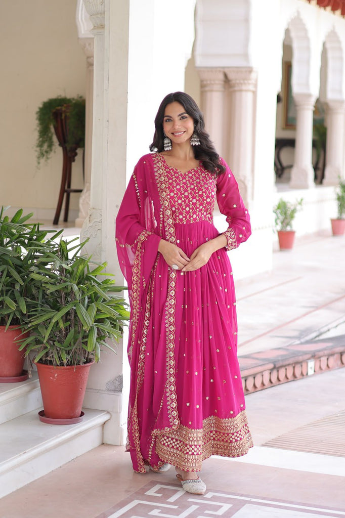 Rani Pink Rich Sequins & Zari Embroidered Faux Georgette Gown with Cut-Work Dupatta – Full Sleeves, Fancy V-Neck, Fully Stitched ClothsVilla