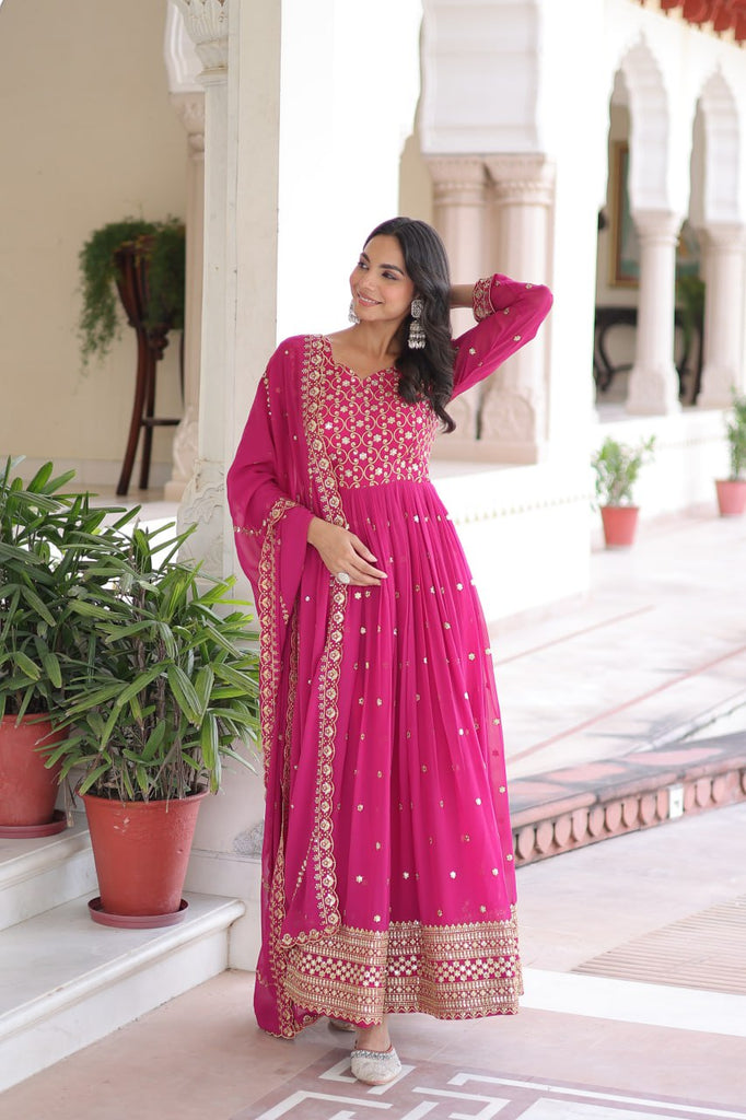 Rani Pink Rich Sequins & Zari Embroidered Faux Georgette Gown with Cut-Work Dupatta – Full Sleeves, Fancy V-Neck, Fully Stitched ClothsVilla