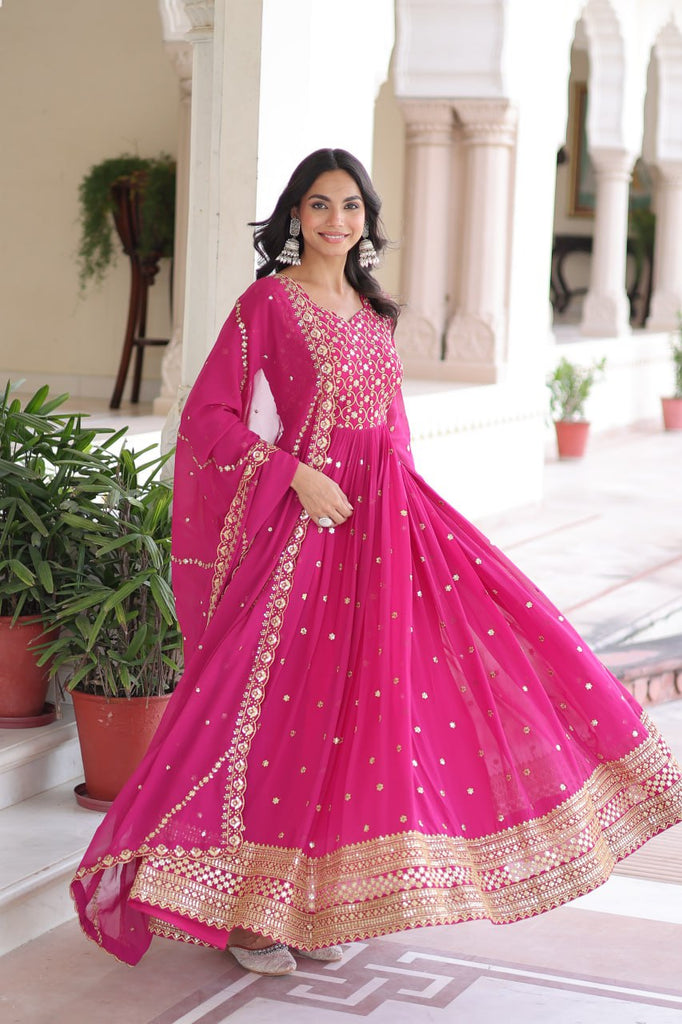 Rani Pink Rich Sequins & Zari Embroidered Faux Georgette Gown with Cut-Work Dupatta – Full Sleeves, Fancy V-Neck, Fully Stitched ClothsVilla