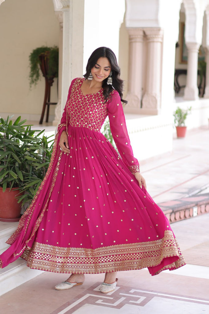 Rani Pink Rich Sequins & Zari Embroidered Faux Georgette Gown with Cut-Work Dupatta – Full Sleeves, Fancy V-Neck, Fully Stitched ClothsVilla