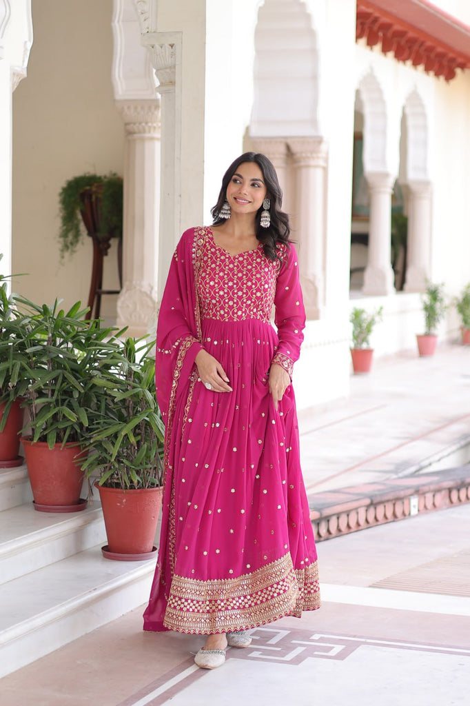 Rani Pink Rich Sequins & Zari Embroidered Faux Georgette Gown with Cut-Work Dupatta – Full Sleeves, Fancy V-Neck, Fully Stitched ClothsVilla