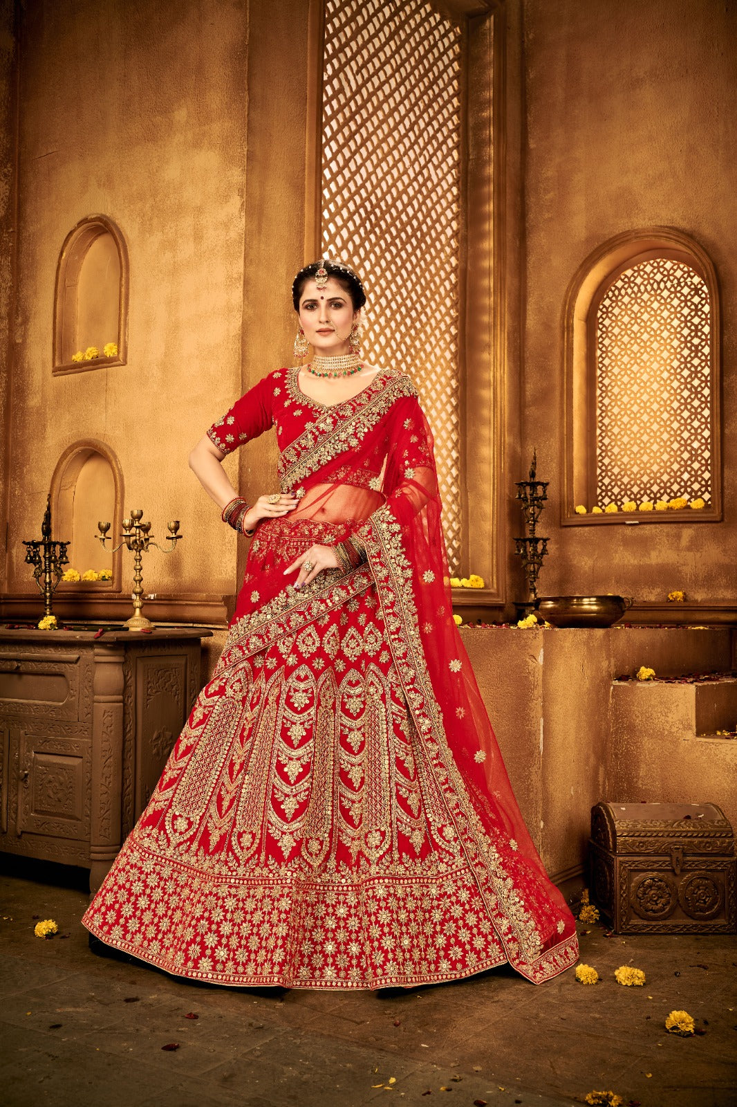 Buy Red Zari Embroidery Velvet Bridal Wear Lehenga from Ethnic Plus.