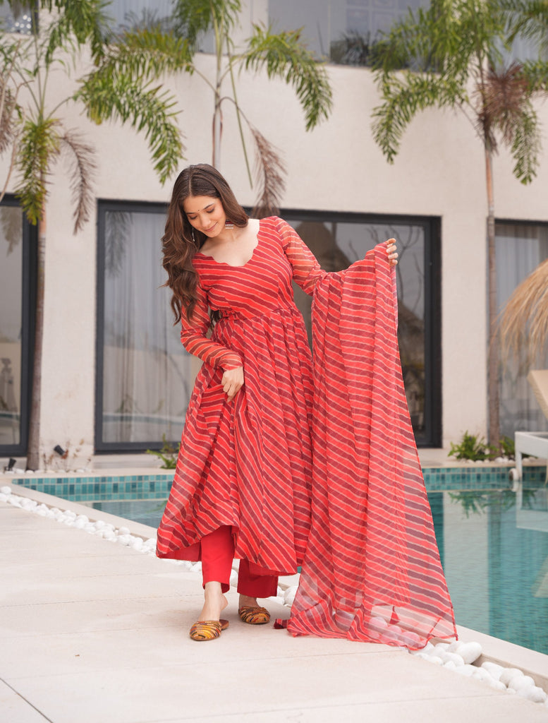 Red Elegant Tabby Organza Top with Laheriya Print, Crape Bottom & Matching Dupatta ClothsVilla