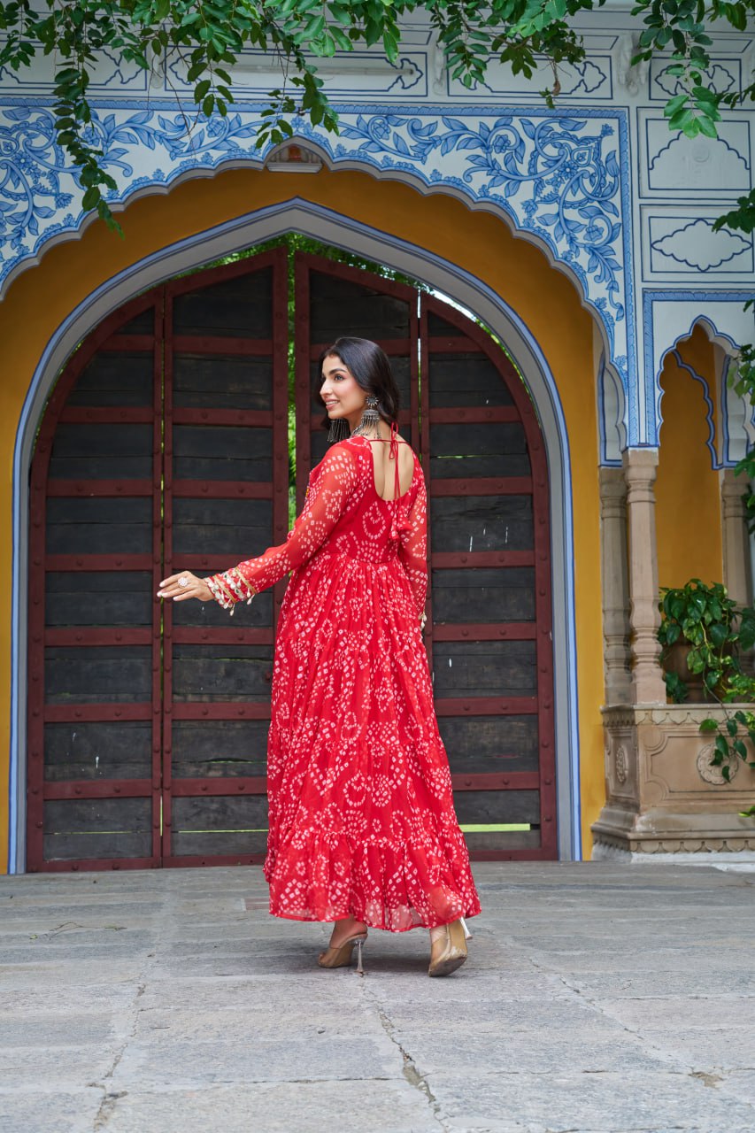 Red Faux Georgette Bandhani Print Gown with Kutchi Patchwork – Full Sleeves, 12 Meter Flair, Cotton Lining ClothsVilla