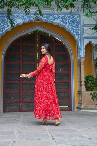 Red Faux Georgette Bandhani Print Gown with Kutchi Patchwork – Full Sleeves, 12 Meter Flair, Cotton Lining ClothsVilla