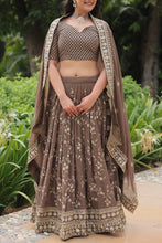 Load image into Gallery viewer, Roman Coffee Faux Blooming Lehenga Choli with Heavy Embroidery and Designer Dupatta ClothsVilla