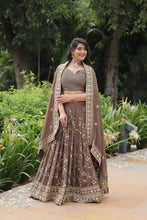 Load image into Gallery viewer, Roman Coffee Faux Blooming Lehenga Choli with Heavy Embroidery and Designer Dupatta ClothsVilla