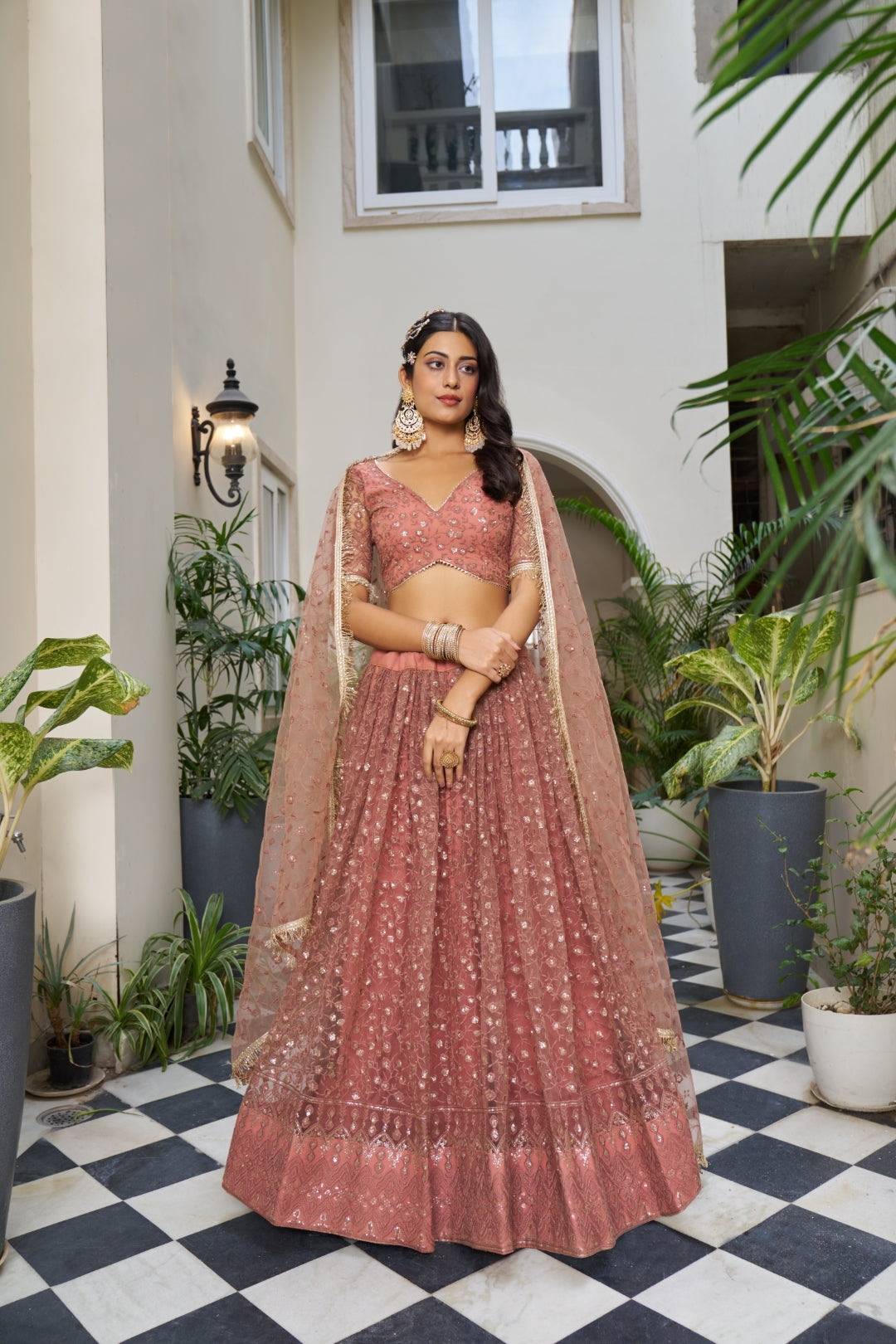 Rust Butterfly Net Lehenga with Tone-to-Tone Embroidery and Sequins Main image
