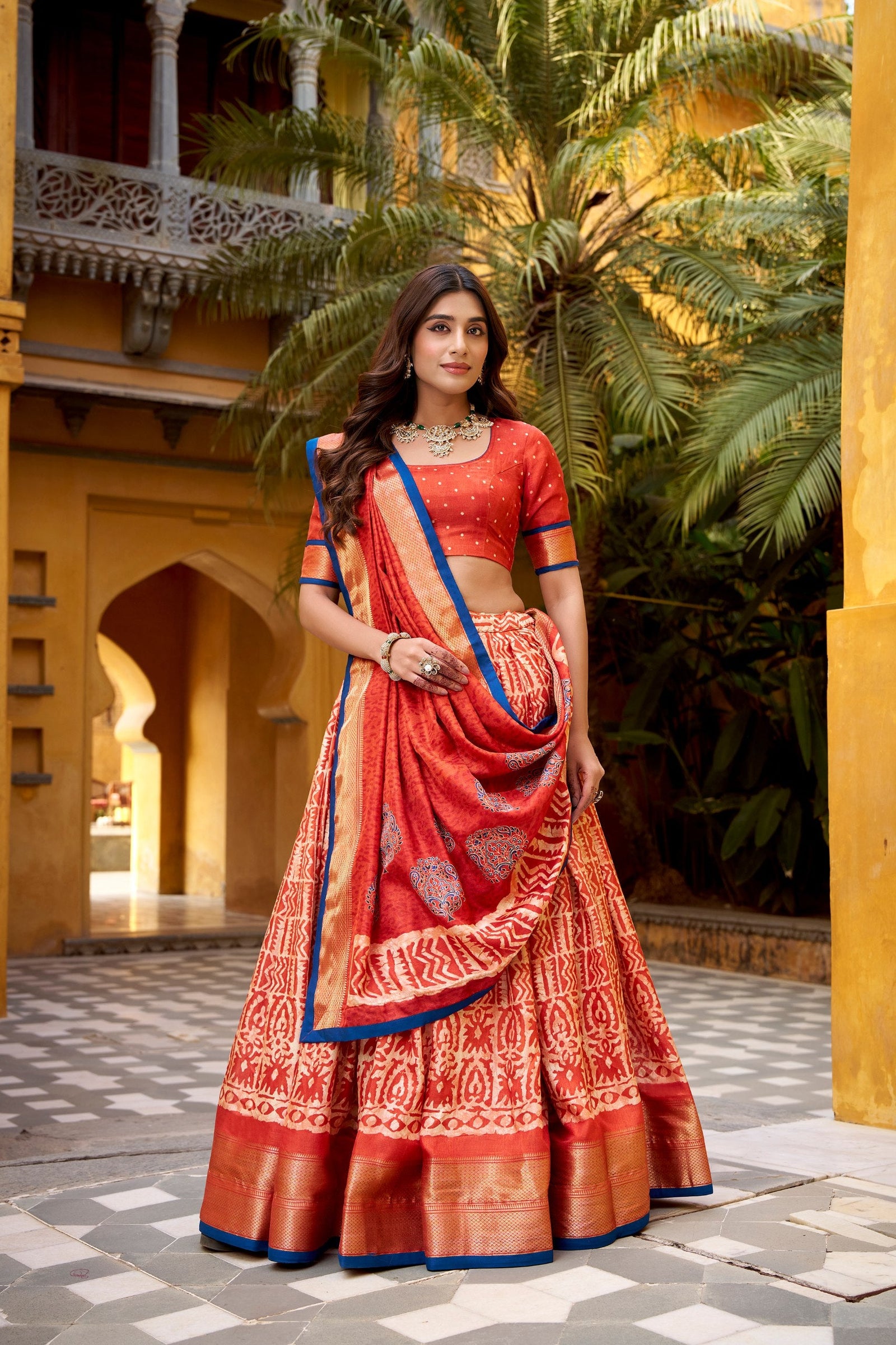 Rust Dola Silk Batik Print Lehenga Choli Set with Zari Weaving & Matching Dupatta – Fully Stitched Designer Ethnic Wear ClothsVilla