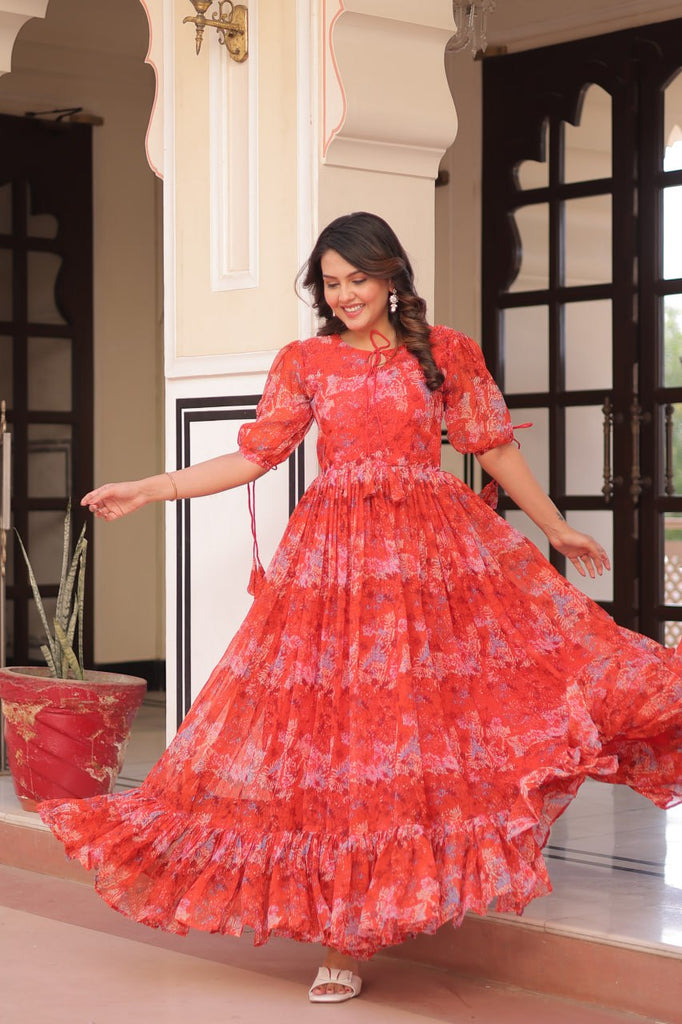 Rust Printed Faux Georgette Anarkali Gown with 7-Meter Flair and Bell Sleeves ClothsVilla