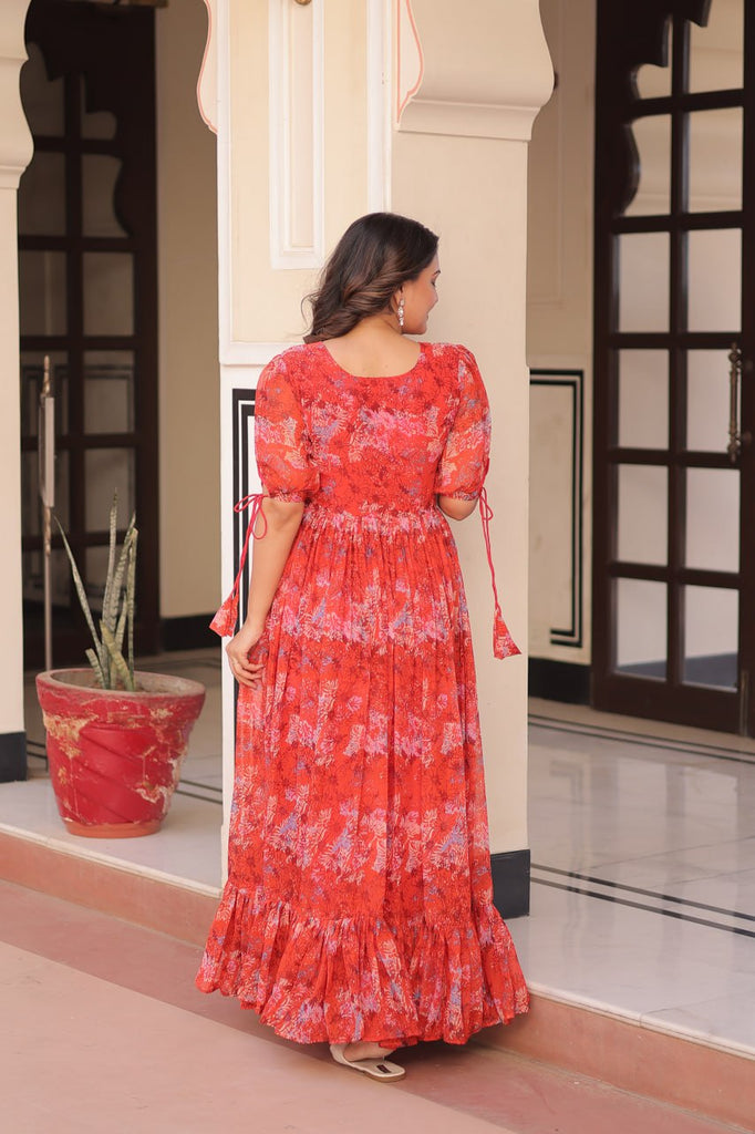 Rust Printed Faux Georgette Anarkali Gown with 7-Meter Flair and Bell Sleeves ClothsVilla