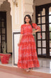 Load image into Gallery viewer, Rust Printed Faux Georgette Anarkali Gown with 7-Meter Flair and Bell Sleeves ClothsVilla