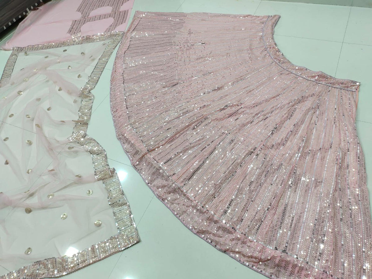 Sequined Georgette Pink Lehenga Set with Net Dupatta ClothsVilla Main image