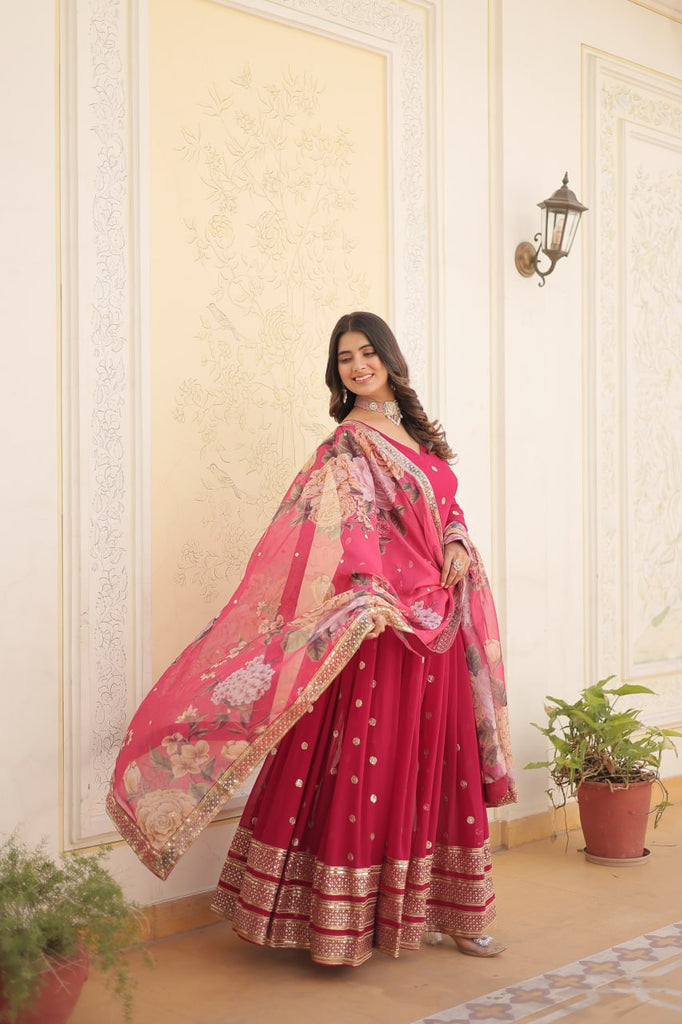 Shimmering Faux Georgette Embroidered Rani Pink Gown with Sequin Accents ClothsVilla