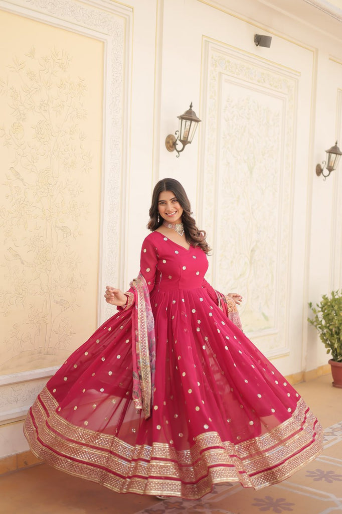 Shimmering Faux Georgette Embroidered Rani Pink Gown with Sequin Accents ClothsVilla