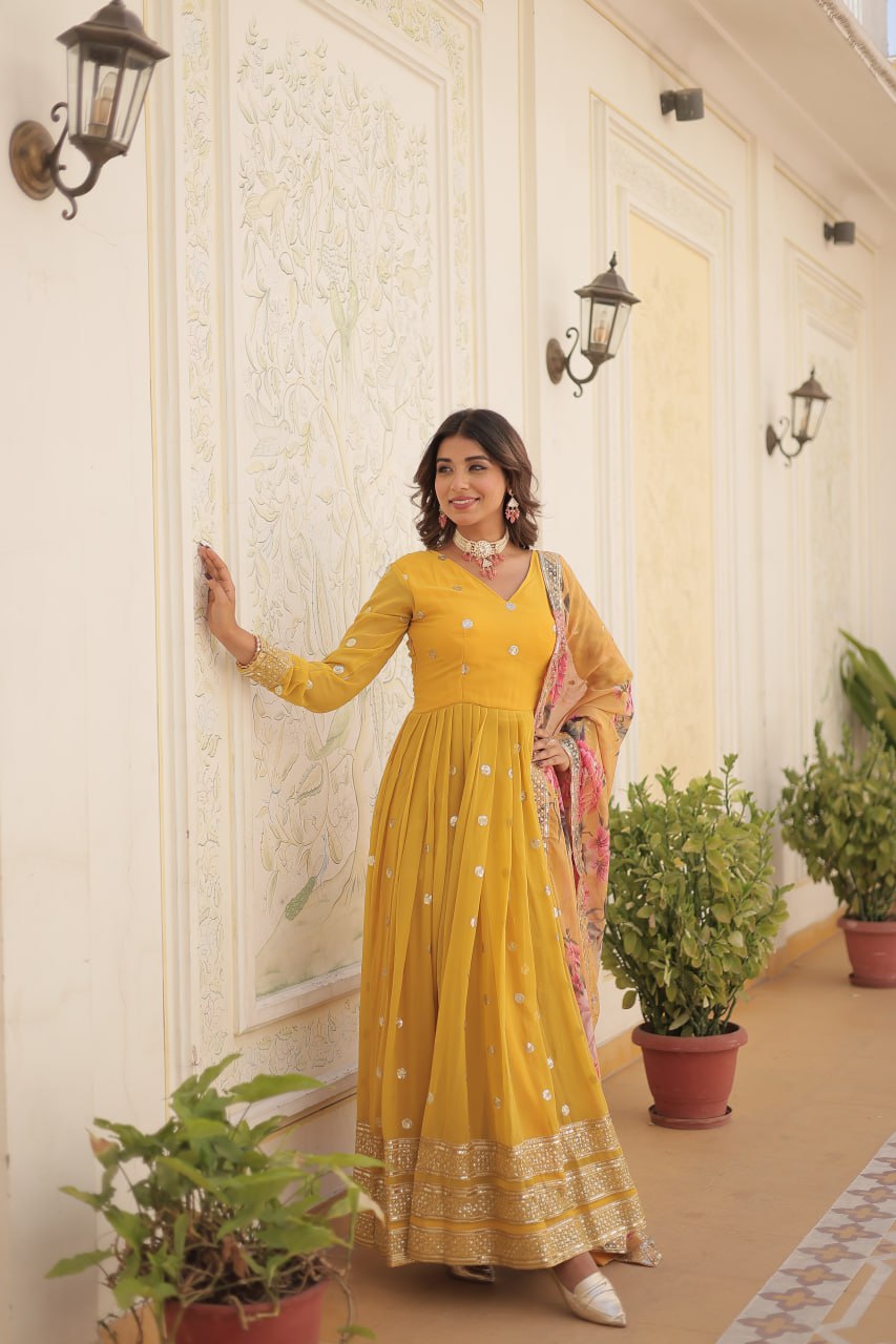 Shimmering Faux Georgette Embroidered Yellow Gown with Sequin Accents ClothsVilla Main image