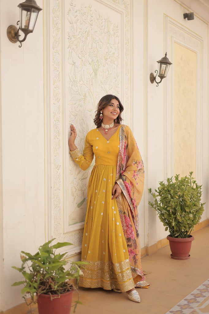 Shimmering Faux Georgette Embroidered Yellow Gown with Sequin Accents ClothsVilla