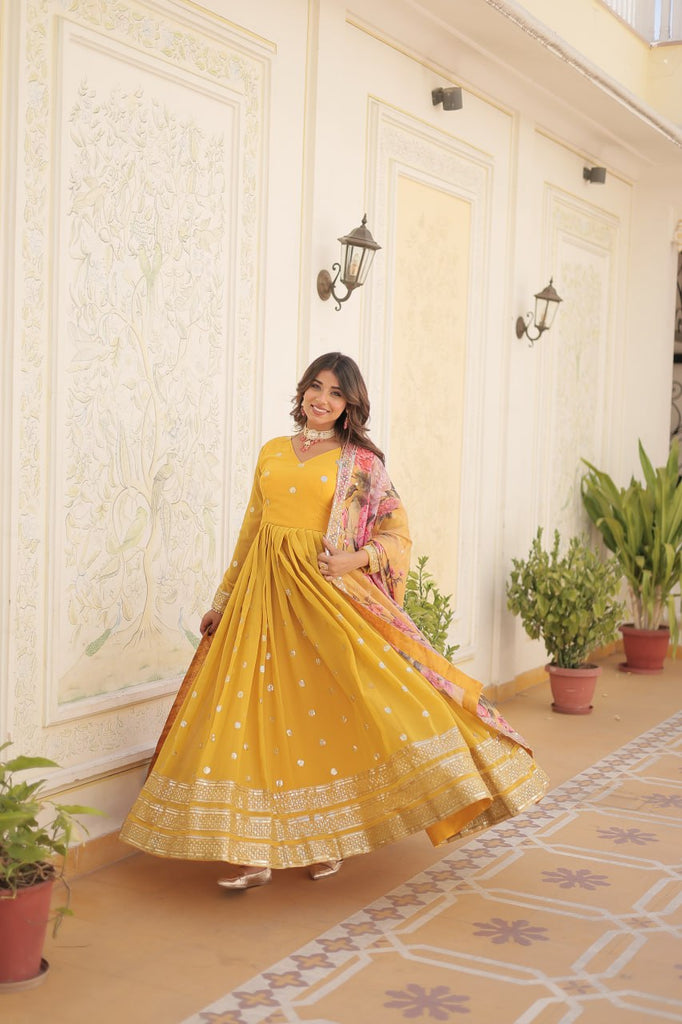 Shimmering Faux Georgette Embroidered Yellow Gown with Sequin Accents ClothsVilla