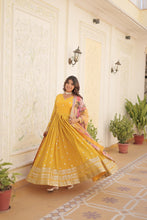 Load image into Gallery viewer, Shimmering Faux Georgette Embroidered Yellow Gown with Sequin Accents ClothsVilla