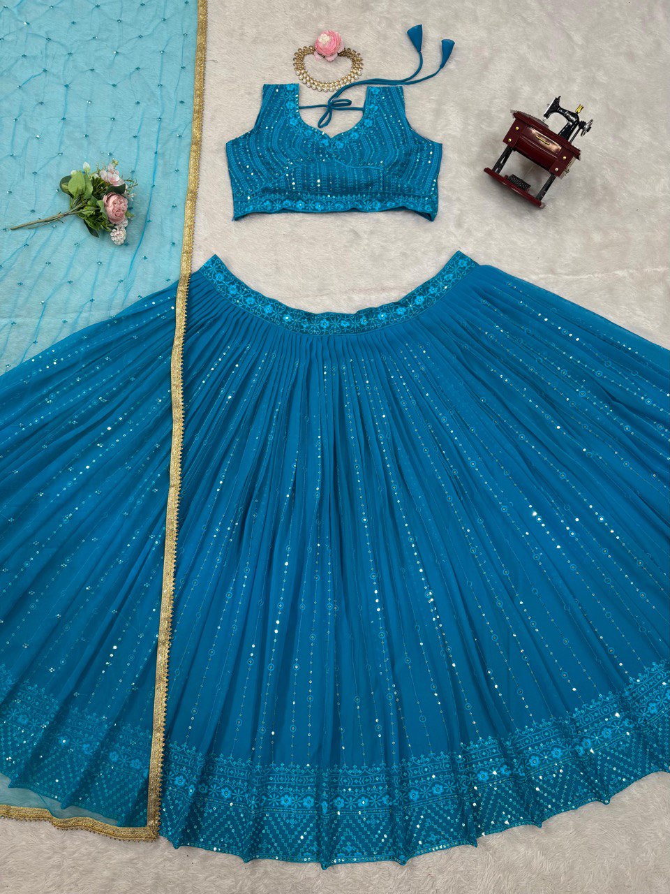Sky Blue Elegant Fox Georgette Semi-Stitched Lehenga Set with Sequin Embroidery & Butterfly Net Dupatta ClothsVilla