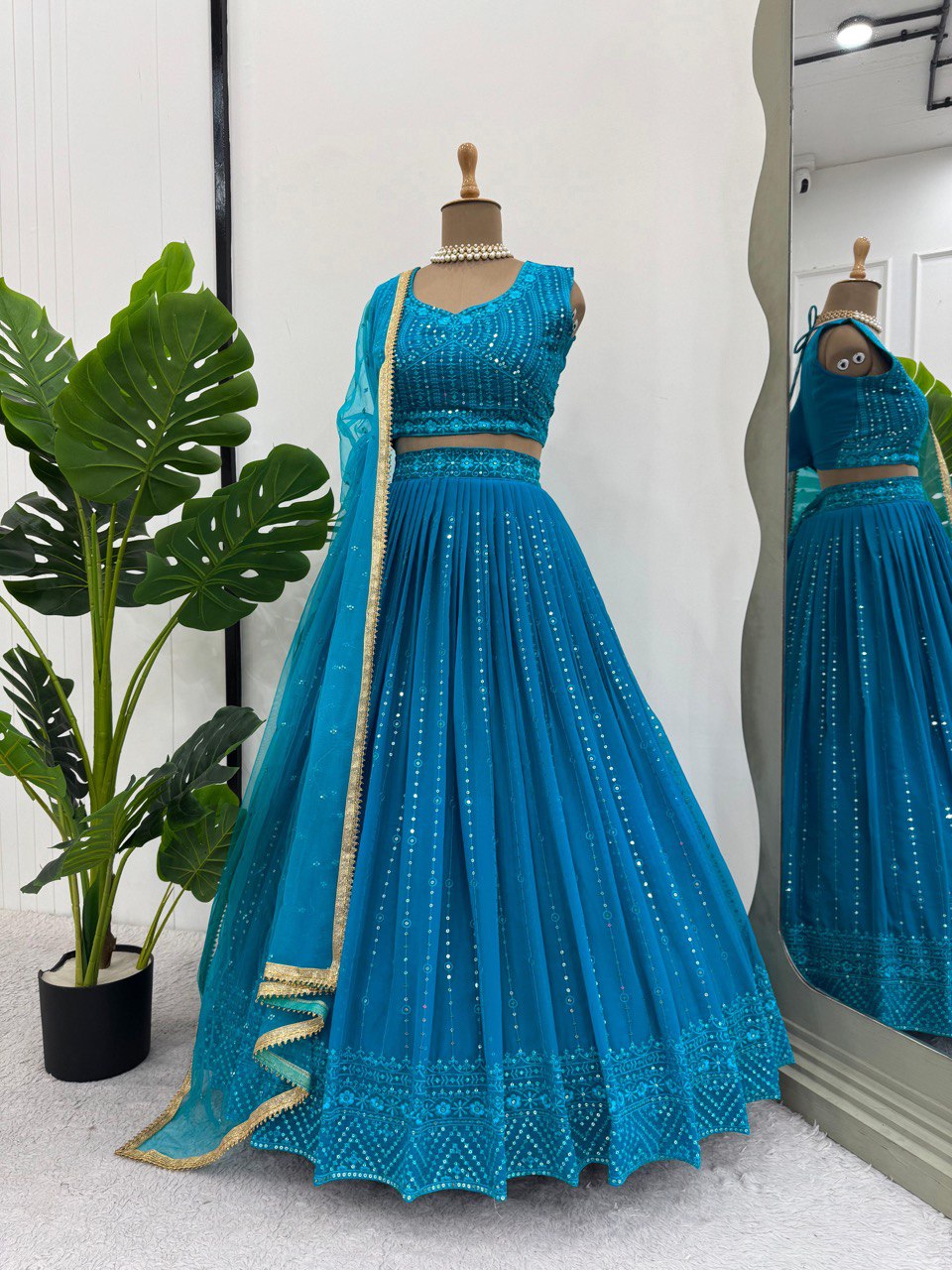 Sky Blue Elegant Fox Georgette Semi-Stitched Lehenga Set with Sequin Embroidery & Butterfly Net Dupatta ClothsVilla Main image