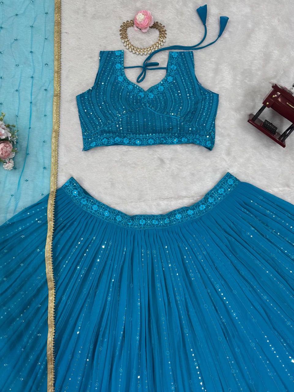 Sky Blue Elegant Fox Georgette Semi-Stitched Lehenga Set with Sequin Embroidery & Butterfly Net Dupatta ClothsVilla