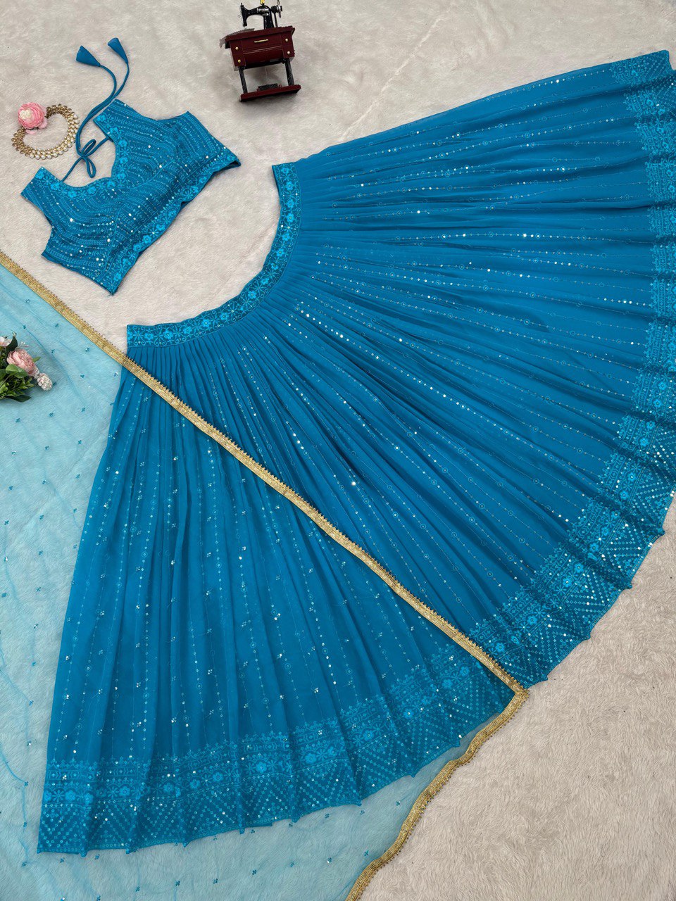 Sky Blue Elegant Fox Georgette Semi-Stitched Lehenga Set with Sequin Embroidery & Butterfly Net Dupatta ClothsVilla