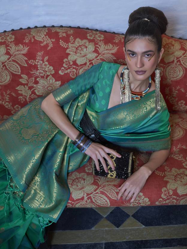 Sky Blue Elegant Printed Chanderi Silk Blend Saree with Tassel Detailing ClothsVilla