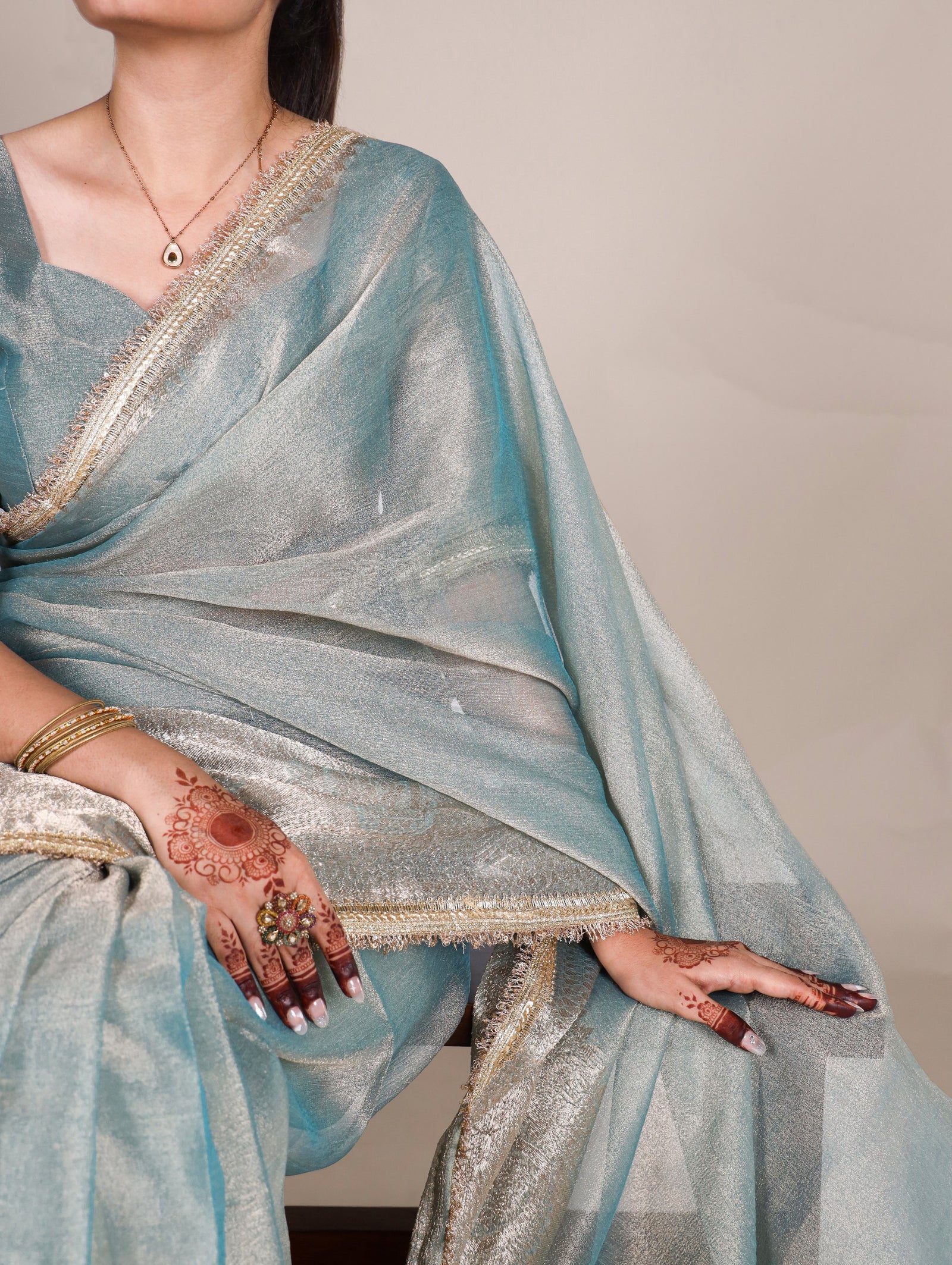 Sky Blue Elegant Tissue Shimmer Saree with Zari Weaving and Sequins Lace Border