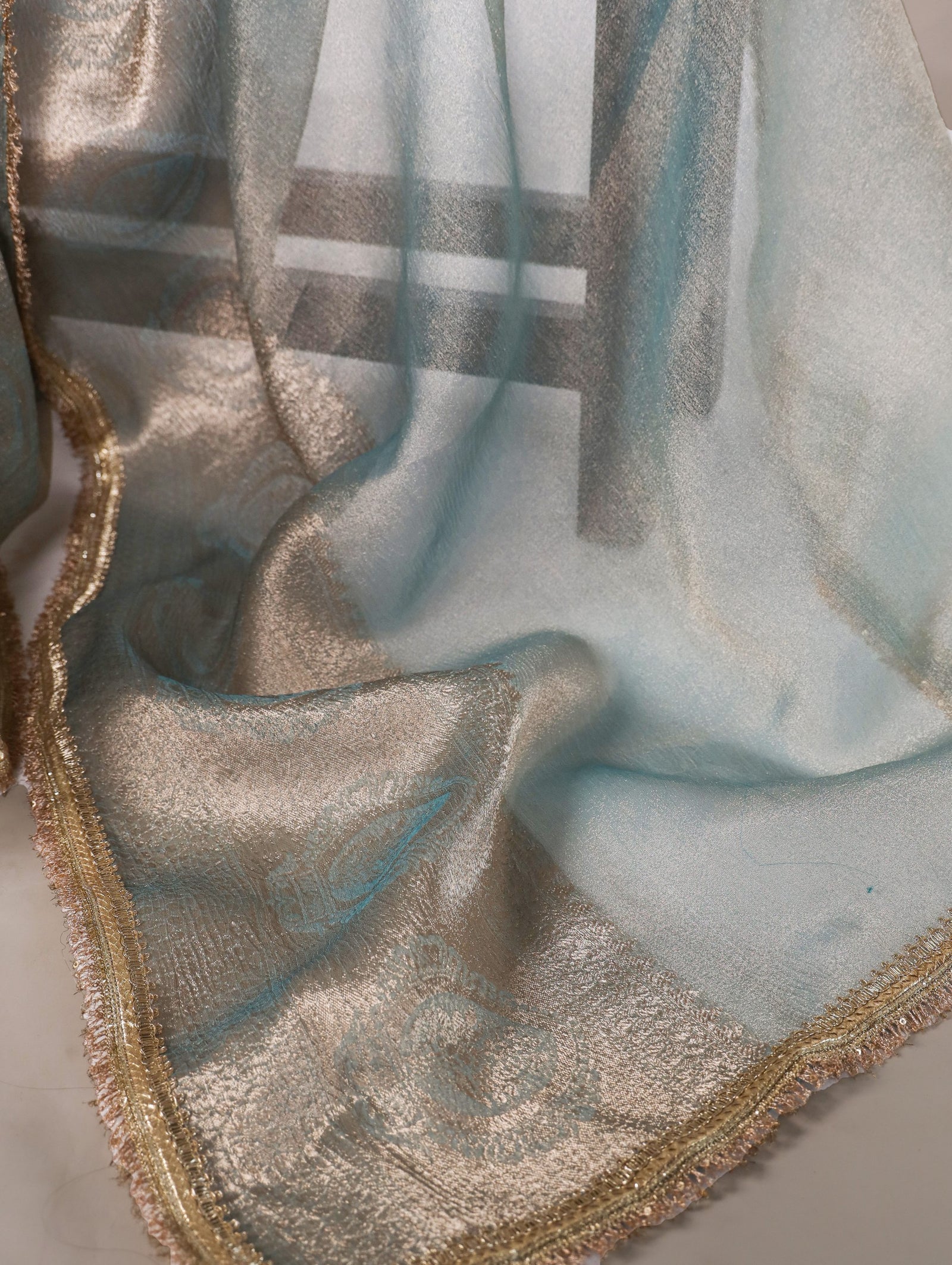 Sky Blue Elegant Tissue Shimmer Saree with Zari Weaving and Sequins Lace Border