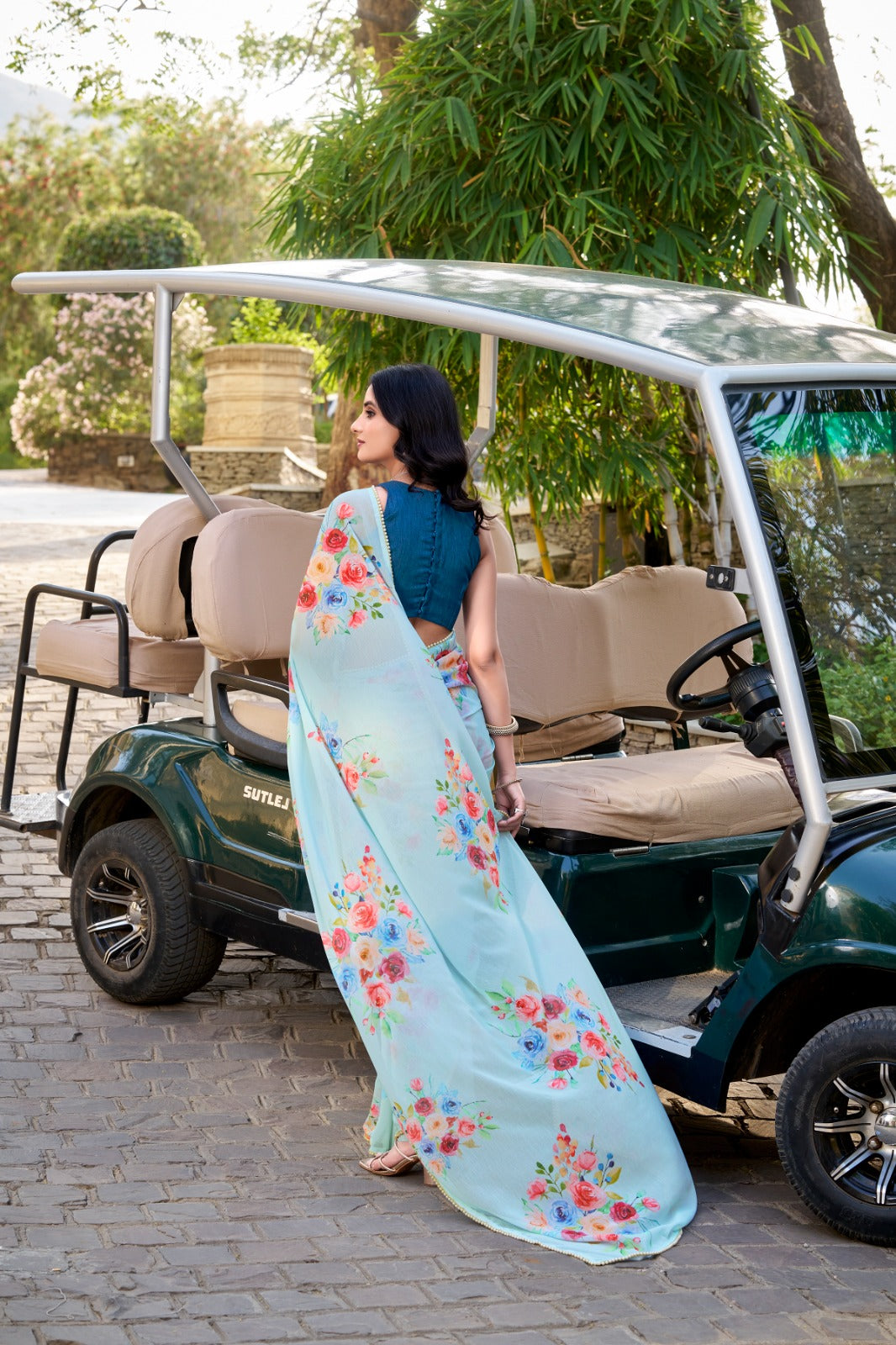 Sky Blue Graceful Weightless Marble Saree with Floral Print & Pearl Lace Border – Includes Banglory Blouse Piece ClothsVilla