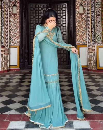 Sky Blue Heavy Faux Georgette Embroidered Suit Set with Rivet Moti Work & Mirror Lace Dupatta ClothsVilla