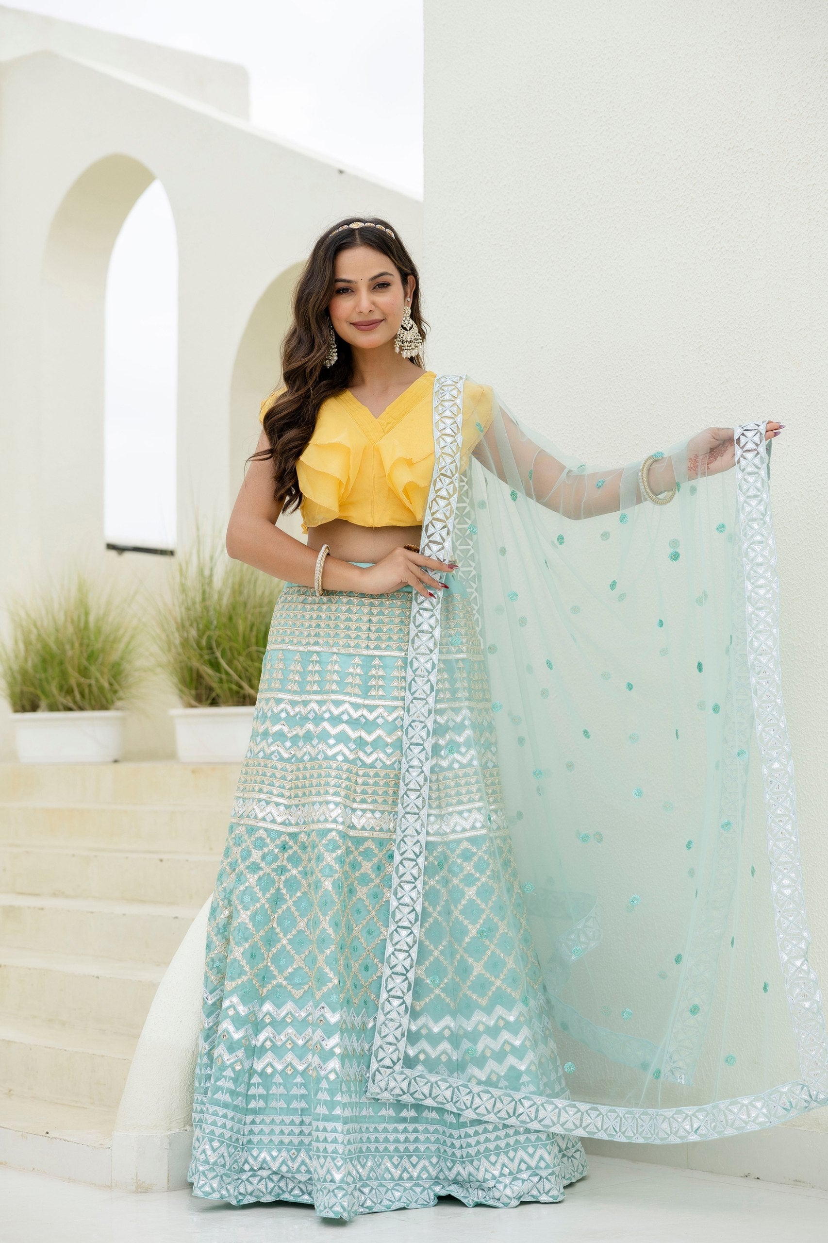 Sky & Yellow Graceful Organza Lehenga Set with Sequins & Foil Embroidery – Semi-Stitched Lehenga, Unstitched Blouse & Net Dupatta ClothsVilla