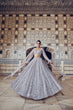 Load image into Gallery viewer, Smoke Gray Shimmer Silk Lehenga Set with Sequins &amp; Dori Work – Unstitched Blouse &amp; Net Dupatta ClothsVilla