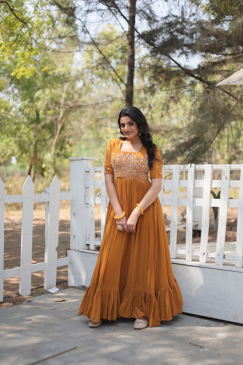 Sparkling Multithreaded Embroidered Faux Georgette Mustard Yellow Gown with Puff Sleeves ClothsVilla