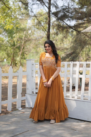 Sparkling Multithreaded Embroidered Faux Georgette Mustard Yellow Gown with Puff Sleeves ClothsVilla