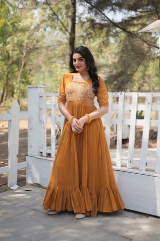Sparkling Multithreaded Embroidered Faux Georgette Mustard Yellow Gown with Puff Sleeves ClothsVilla