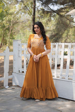 Load image into Gallery viewer, Sparkling Multithreaded Embroidered Faux Georgette Mustard Yellow Gown with Puff Sleeves ClothsVilla