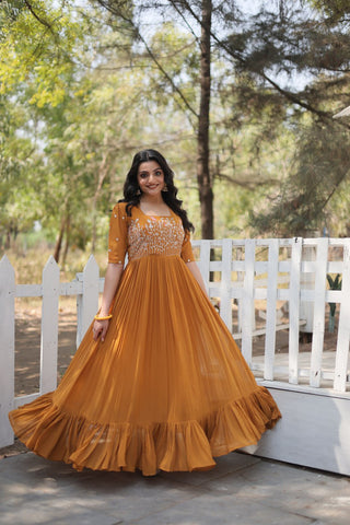 Sparkling Multithreaded Embroidered Faux Georgette Mustard Yellow Gown with Puff Sleeves ClothsVilla